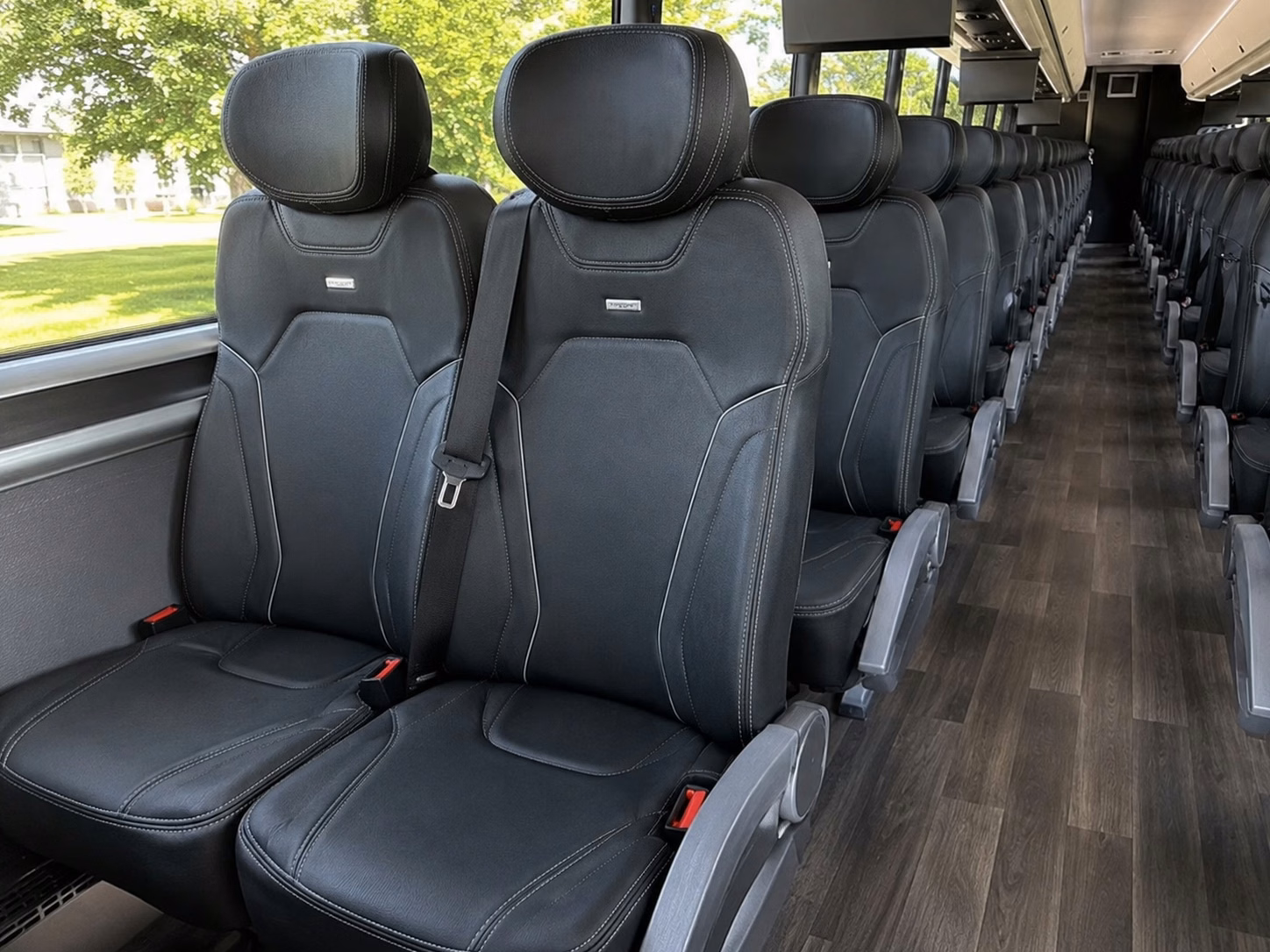 how trip distance and duration affect charter bus rates in cedar rapids